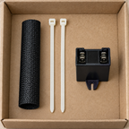 Capacitor, fiberglass sleeve and two ties organized in a plain parts tray
