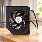 GE WR60X23363 condenser fan assembly displayed on a kitchen preparation counter; illustrative setting, refrigerator and props not included