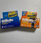 Actual More4less Outlet photo of blue and orange Gillette ProGlide Shield 4-cartridge packaging; each purchase is one 4-count pack