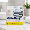 Illustrated overview of the Gillette SkinGuard 8-count refill carton.