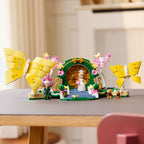 LEGO Wicked Glinda’s Wedding Day 75688 completed wedding scene displayed on a table with two butterflies, minidolls and animals.