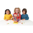 Children playing Goliath Smack N Snack and pressing the vending-machine game