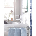 Manufacturer image of GROHE Essentials 40371001 chrome swivel towel bar beside a basin, with a towel shown for context; towel and basin not included.