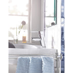 Manufacturer image of GROHE Essentials 40371001 chrome swivel towel bar beside a basin, with a towel shown for context; towel and basin not included.