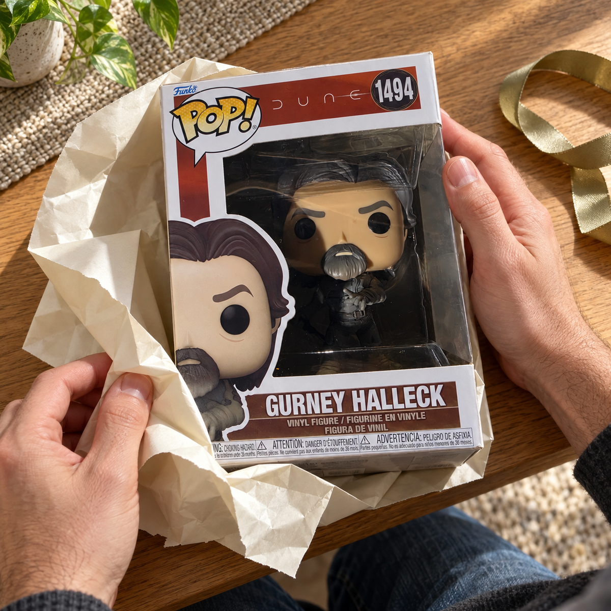Boxed Funko Pop! Gurney Halleck #1494 being unwrapped from gift tissue.