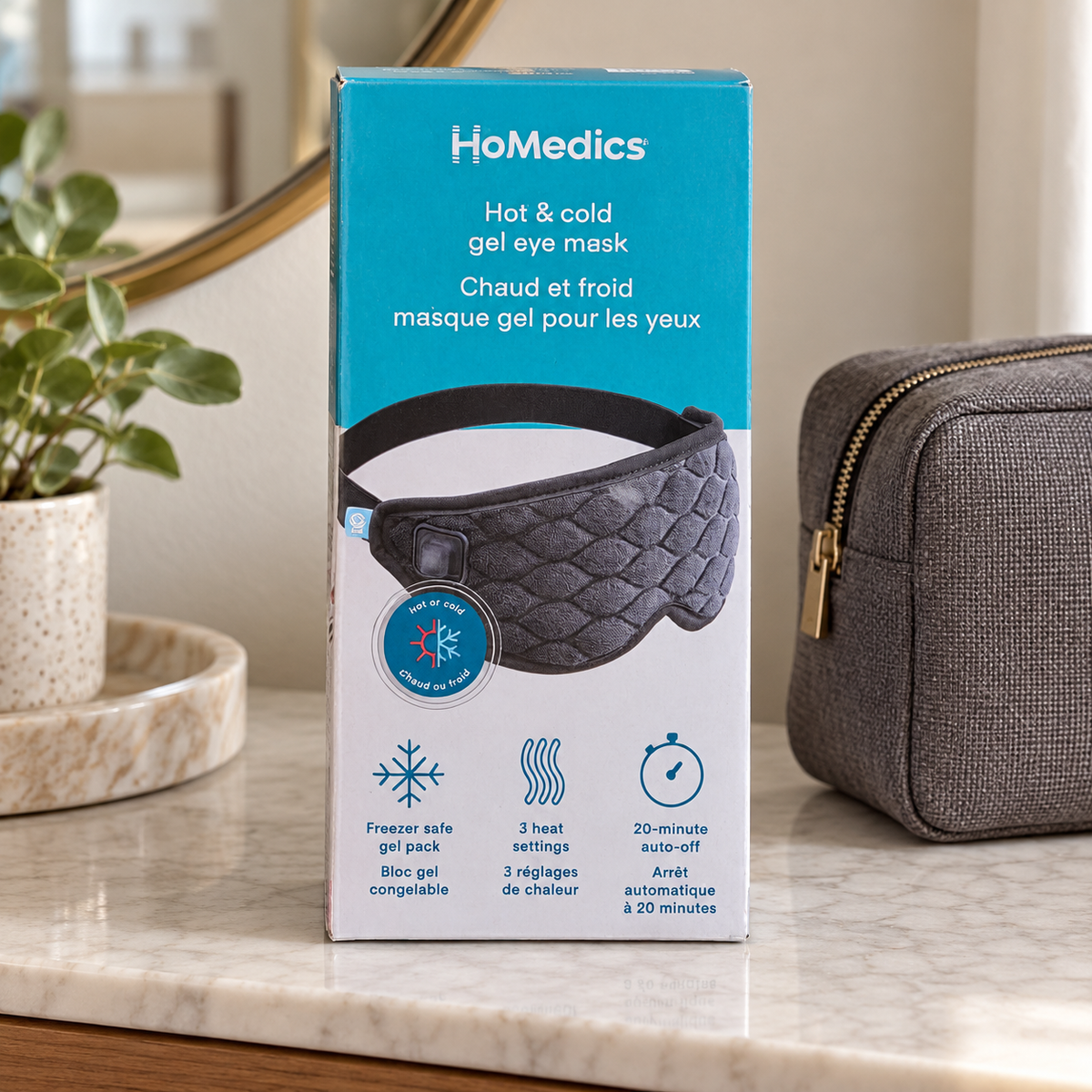 AI lifestyle illustration of HoMedics HP-G42A-CA boxed eye mask in travel preparation setting; props not included