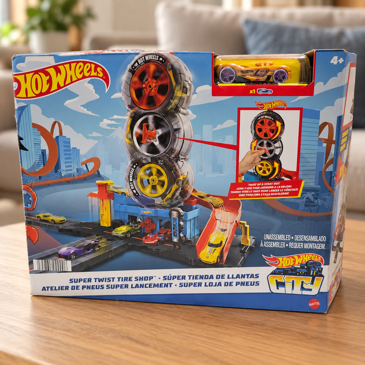 Hot Wheels City Super Twist Tire Shop retail box in a home setting 1