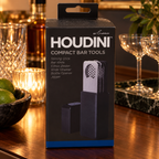 Houdini compact bar tools retail box in sideboard setting; AI-generated lifestyle scene