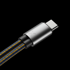 Close-up of tightly woven double braided nylon and DuPont Kevlar fiber USB charging cable showing dual-shade weave texture and silver connector — More4less Outlet