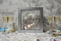Simplee Adesso Let's Party LED light box on party table with champagne glasses lifestyle