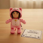 Stumble Guys Pink Cat Plush Buddy next to More4less Outlet Stuffed Friend Adoption Certificate gift unboxing - More4less Outlet