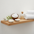 White tea and coconut bathroom essentials lifestyle flat lay