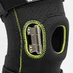 Macro close-up bilateral metal joint stabilizer hinges DonJoy knee brace perforated neoprene — More4less Outlet