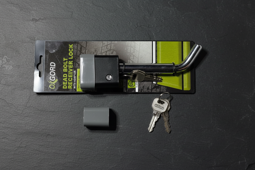 OxGord deadbolt receiver lock flatlay on dark slate with retail pack two keys and adaptor displayed - More4less Outlet