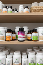 NeoCell Marine Collagen on modern wooden wellness closet shelf alongside clean-label whole-food supplements