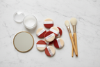 Olivia Rose multi-color mini powder puffs beside spa brushes loose powder cosmetics marble — More4less Outlet