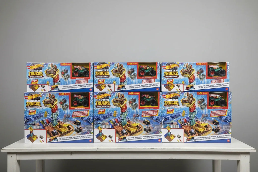 Organized toy shelf display of Hot Wheels Monster Trucks Arena Smashers retail box