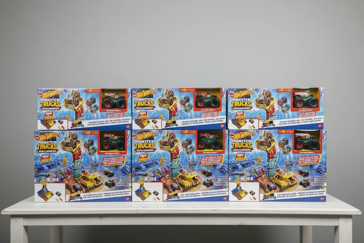 Organized toy shelf display of Hot Wheels Monster Trucks Arena Smashers retail box