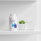GNC Potassium & Magnesium Aspartate on wellness shelf with succulent and glass of water – More4less Outlet