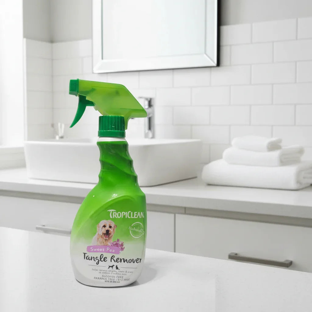TropiClean Sweet Pea Tangle Remover 16 oz in modern bathroom setting