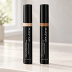 Mary Kay Perfecting Concealer tubes in Deep Ivory and Deep Bronze on a softly lit vanity