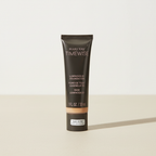 Mary Kay TimeWise Luminous 3D Foundation tube in Ivory N 160 on a neutral studio background
