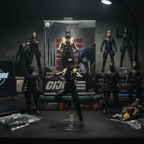 G.I. Joe Classified Series Akiko figure in dynamic martial arts pose on a collector desk with cinematic dark lighting and G.I. Joe figures in background — More4less Outlet