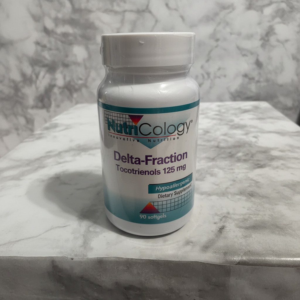 AI-generated lifestyle image of NutriCology Delta-Fraction Tocotrienols 125 mg, 90 Softgels bottle on a light marble surface