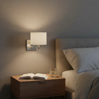 Globe Electric Anderson Wall Sconce mounted in modern bedroom above nightstand