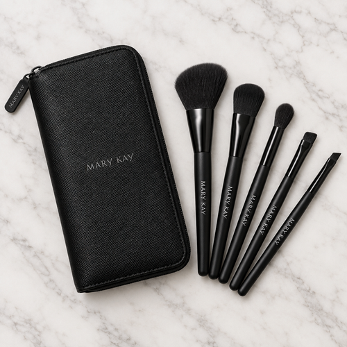 Mary Kay Essential Brush Collection zippered case and brushes on a marble surface