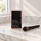 AI-generated lifestyle photo of the Mary Kay Blending Sponge box with a makeup brush on a marble vanity