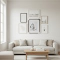Mikasa grey wood grain frame on minimalist gallery wall in bright modern living room