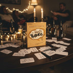 The Game of Nasty Things party game displayed on dark table with answer cards and moody lighting