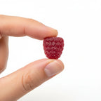 Close-up of raspberry colored children's vitamin gummy macro natural light