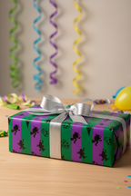 TMNT Mutations Mechazoid 03 in packaging displayed on birthday gift box with green and purple wrapping