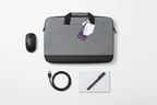 Targus Strata grey heather laptop bag in minimalist tech accessories flat lay with wireless mouse and notebook
