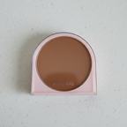 Close view of Mary Kay Endless Performance Crème-to-Powder Foundation compact in Bronze 2