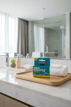 Gillette Mach3 Fresh Clean 4-pack on minimalist wooden hotel tray in upscale bathroom travel routine