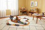 Organized kids play space with Hot Wheels Mario Kart Boo's Spooky Sprint set on clean rug