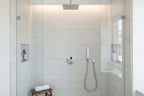 Minimalist professional bathroom shower wall volume control assembly in polished chrome