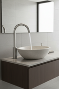 Lordear modern high arc brushed nickel bathroom faucet with water flowing into sleek stone vessel sink in contemporary bathroom
