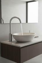 Lordear modern high arc brushed nickel bathroom faucet with water flowing into sleek stone vessel sink in contemporary bathroom