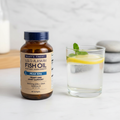 AI-generated contextual image of Wiley's Finest Peak EPA Wild Alaskan Fish Oil 60 Softgels beside water and lemon