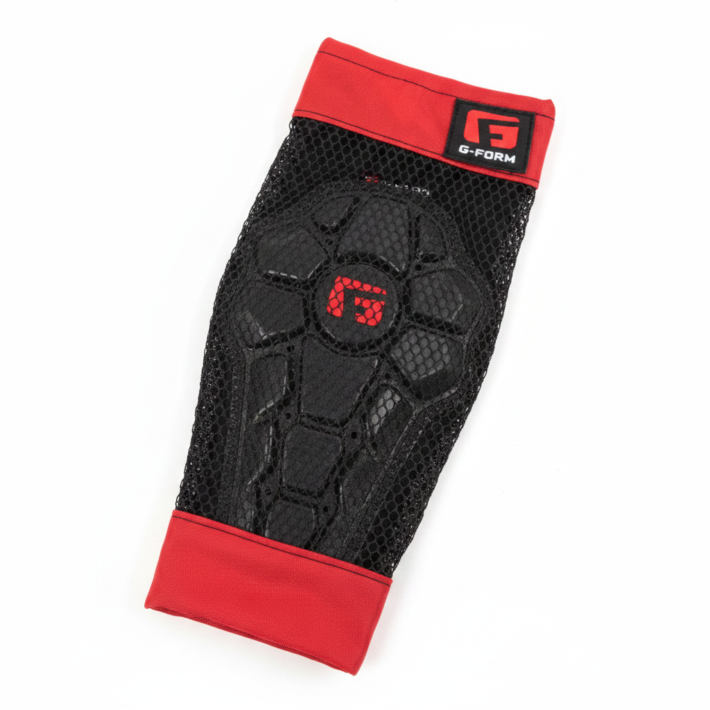Close-up detail of G-Form Youth Pro-X2 Elbow Pads SmartFlex padding and red accent cuff on white background