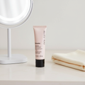 AI-generated lifestyle/context image of Mary Kay TimeWise Matte-Wear Liquid Foundation on a neutral vanity.