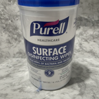 Detailed close-up of custom secondary shrink-wrap layer on Purell Healthcare Surface Disinfecting Wipes canister