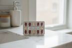 Salus Floradix iron supplement blister pack tablets on clean bathroom vanity countertop