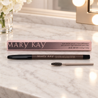 Mary Kay Brow Definer pencil and retail box on a light vanity with a spoolie