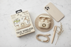 Bytech True Wireless Retro Earbuds beige flat lay with cream retro telephone charging case smartphone and neutral accessories on marble – More4less Outlet