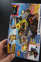Macro in-hand shot of Hot Wheels Monster Trucks Arena Smashers box print details and toy car illustrations